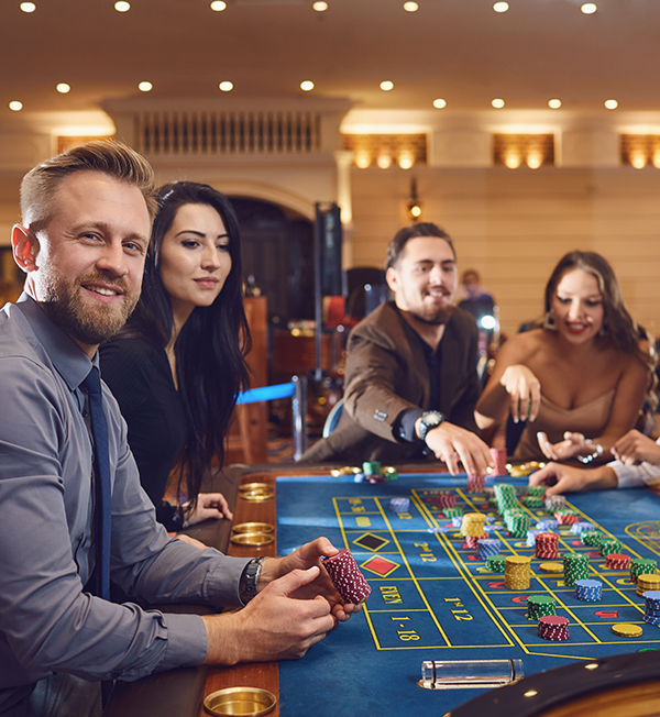 two couples playing roulette